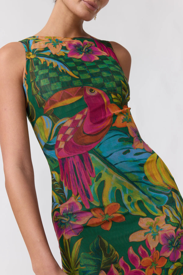 A sleeveless bodycon dress featuring a vibrant tropical print with a pink toucan, green foliage, and colorful flowers, shown on a model against a light gray background.