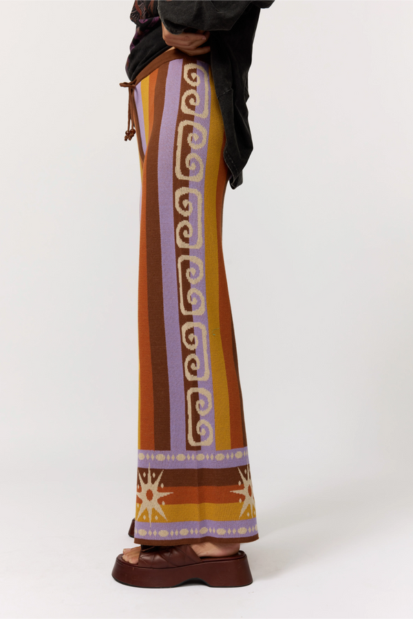 Long, patterned skirt with a white background