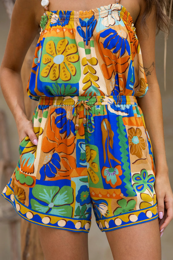 Colorful floral-patterned top and short worn by a person.
